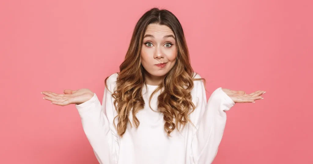 Woman Shrugging Shoulders